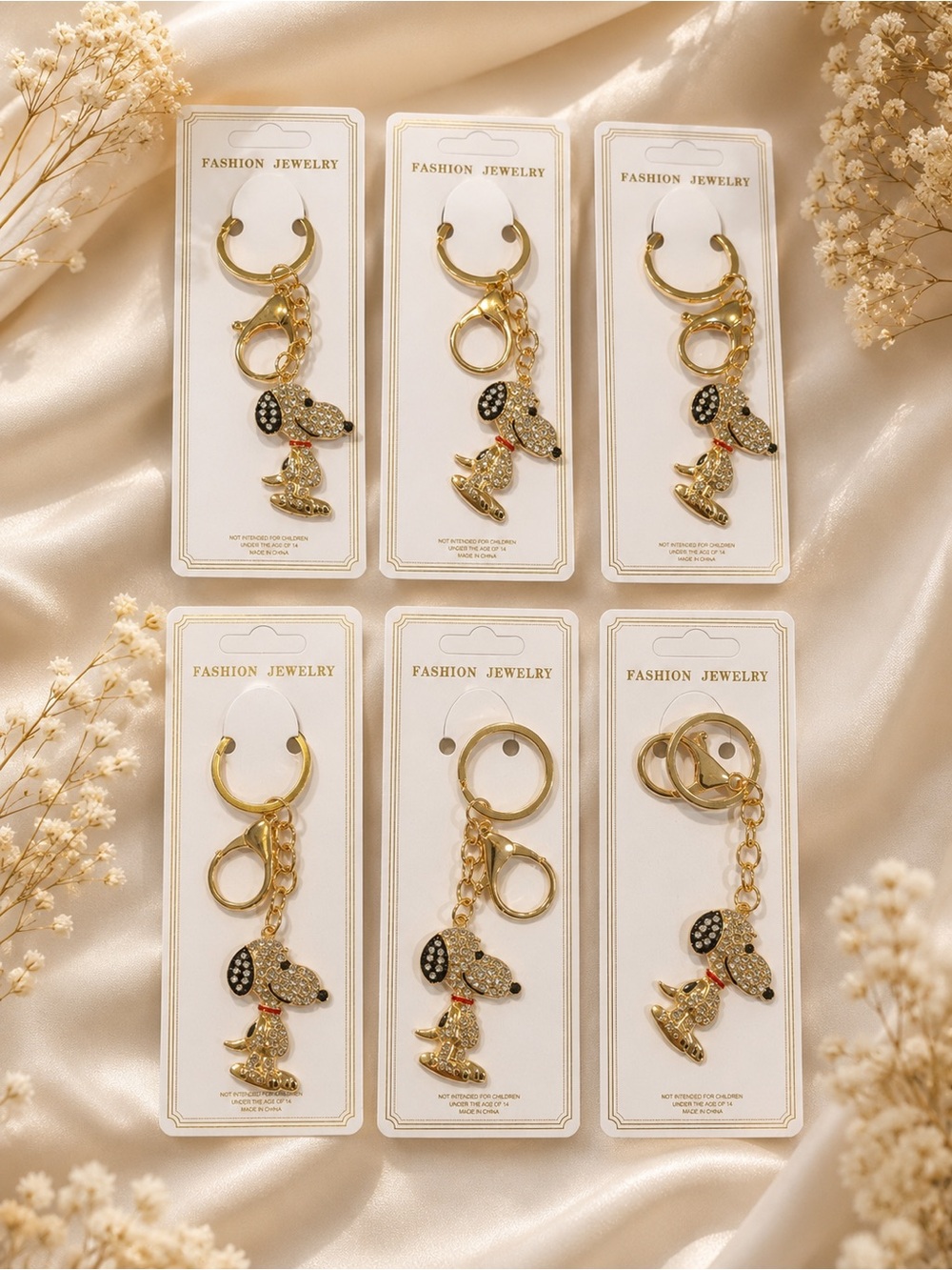 6 gold snoopy charms